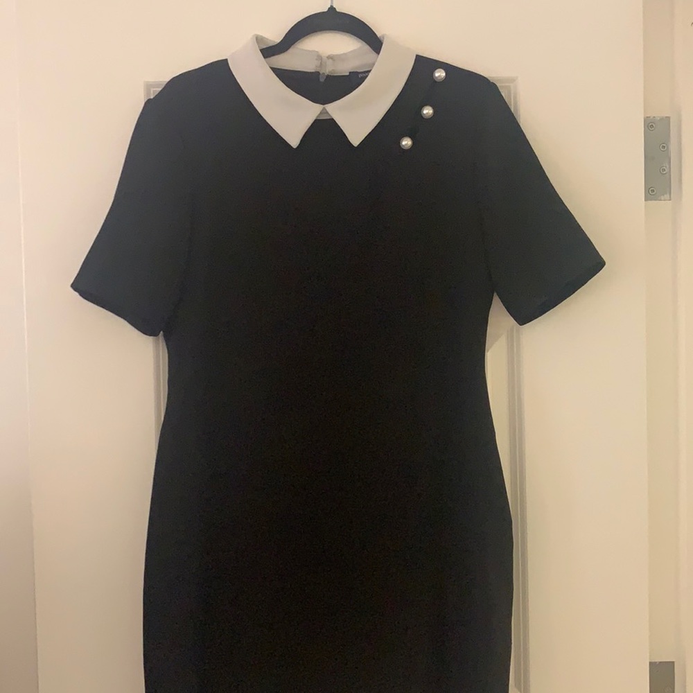 Black and white Ivanka Trump dress with pearls
